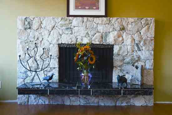 Though beautiful, the fireplace loses more heat than it creates.